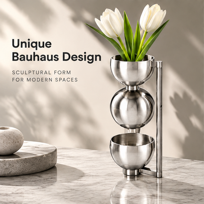 Alternate view of the silver sculptural vase beside Unique Bauhaus Design text