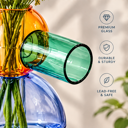 Close-up of the green side tube and orange glass vessel beside glass quality and durability text